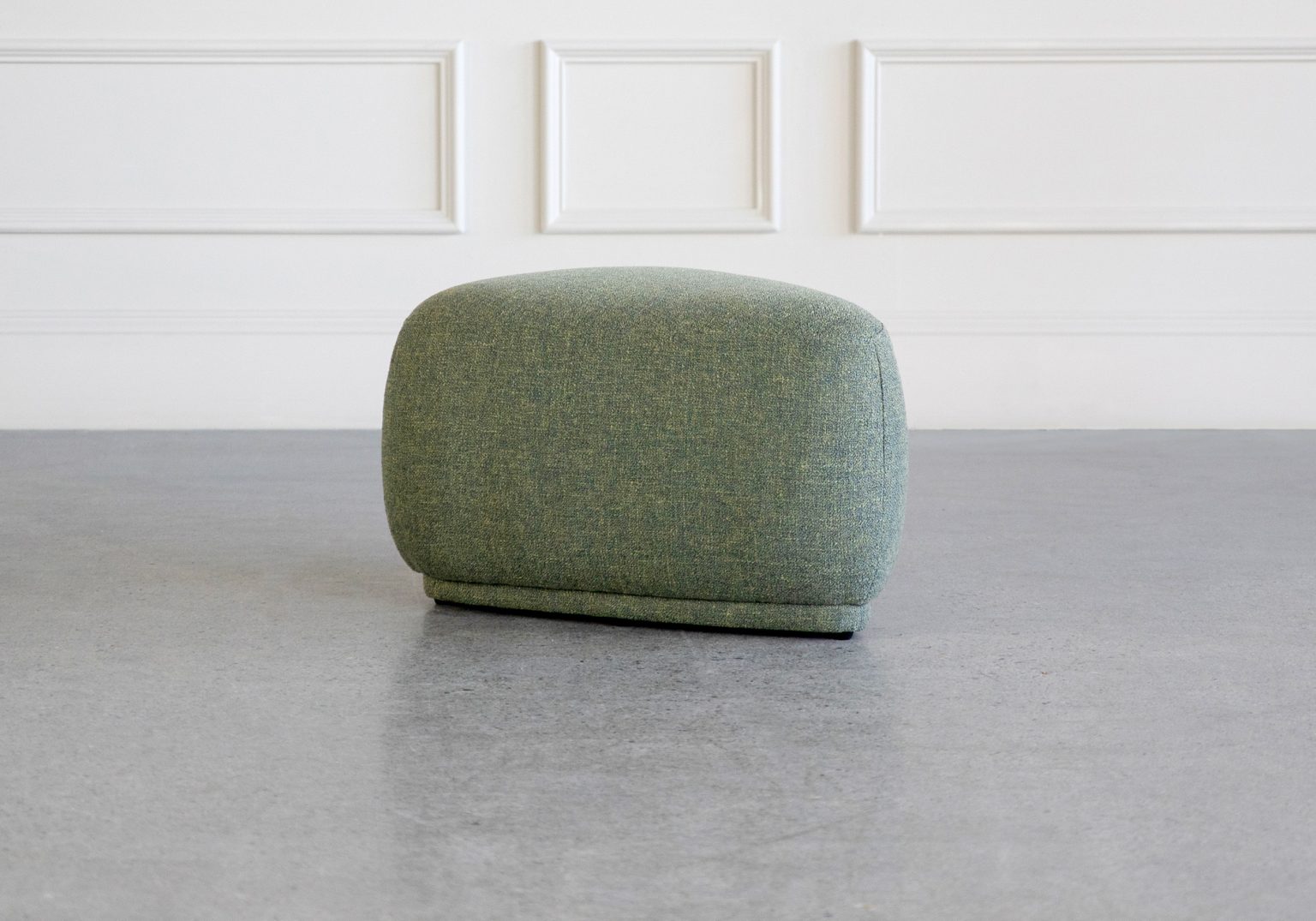 sandy small green fabric ottoman angle